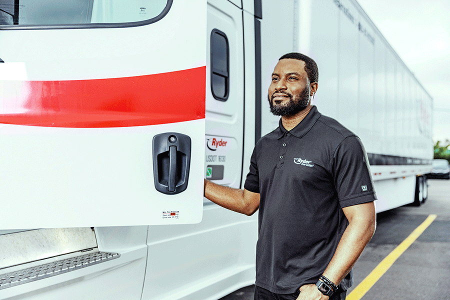 dedicated transportation driver stepping into truck