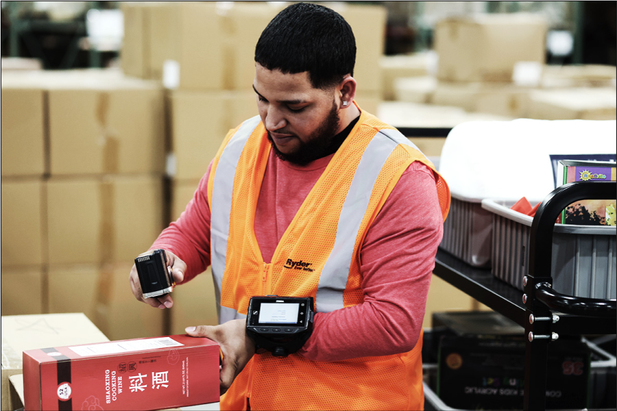 retail store employee replenishing inventory